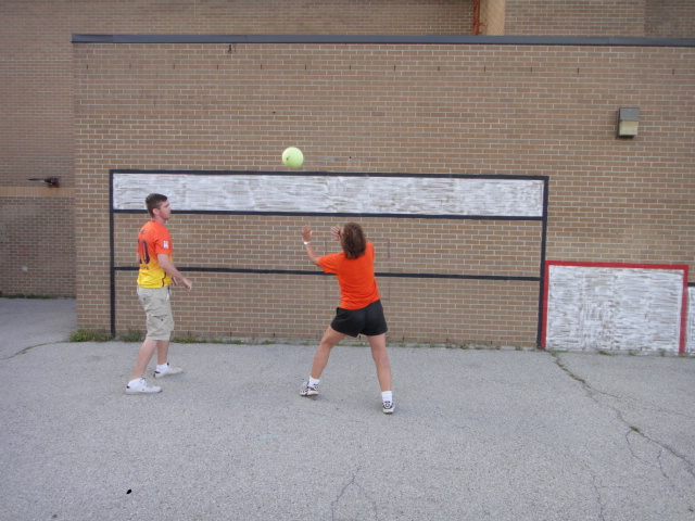 A painted Sportswall court on a schoolyard wall and pavement